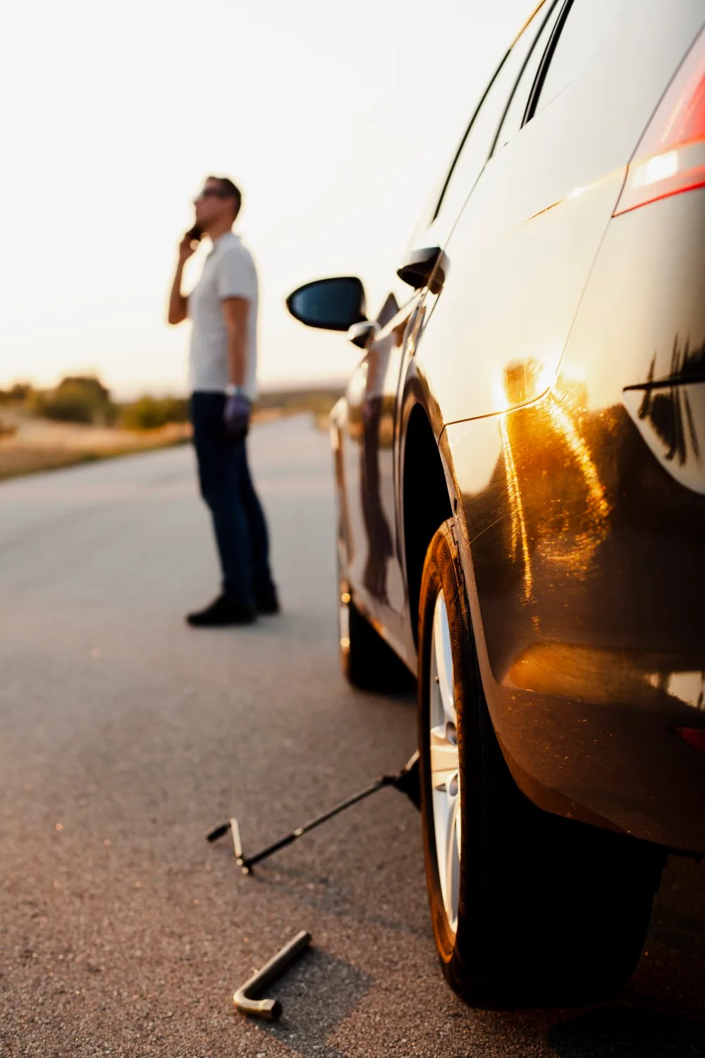 man talking phone about car problem man talking phone about car problem